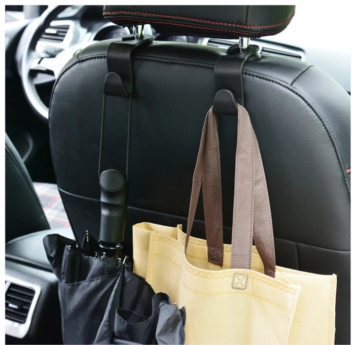 Set of car headrest hooks as packaged