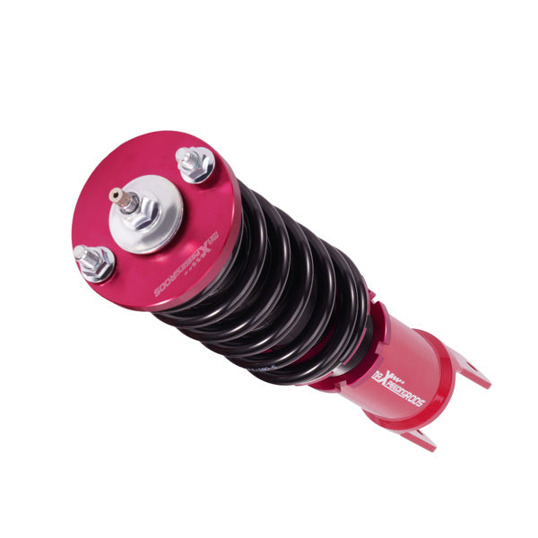 Complete coilover kit contents including four struts and adjustment wrench