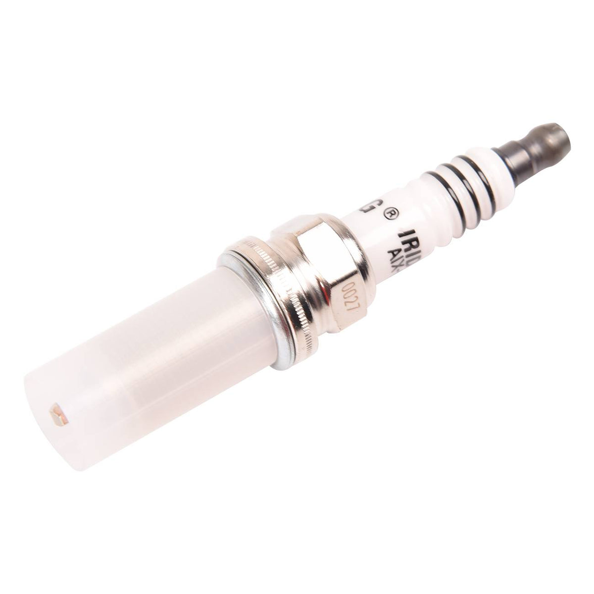 Iridium spark plug electrode tip close-up, PLFR5A11 replacement for Nissan Sentra Frontier Titan